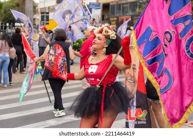 GOIANIA GOIAS BRAZIL - SEPTEMBER 28 2022: A Woman In Red Clothes Dancing In The Street. Photo Taken During A Performance In Favor Of The Presidential Candidate Of Brazil, Lula.