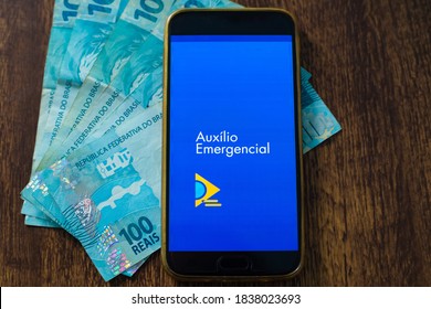 GOIANIA/GOIAS/BRAZIL - OCTOBER 19 2020: Brazilian Emergency Aid App (App CAIXA - Auxílio Emergencial). Aid Paid By The Government During Quarantine Due To The COVID-19 Pandemic.