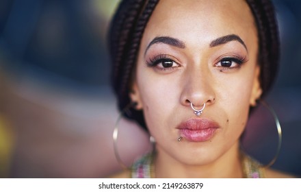 Going For Bold. Portrait Of An Attractive Young Woman With Piercings.