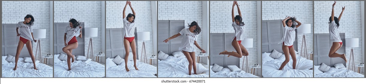 Going crazy. Composite image of playful young woman jumping on the bed while spending carefree time at home