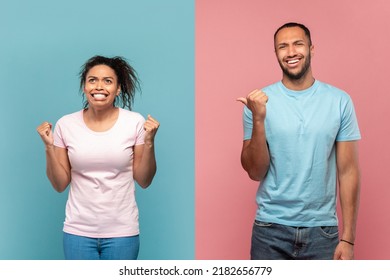 Going Mad. Laughing African American Guy Pointing At His Screaming Crazy Girlfriend, Posing Over Halved Blue And Pink Studio Background