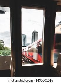 Going pass DLR train, [All logos removed] great composition, would be good for backgrounds and/or websites.