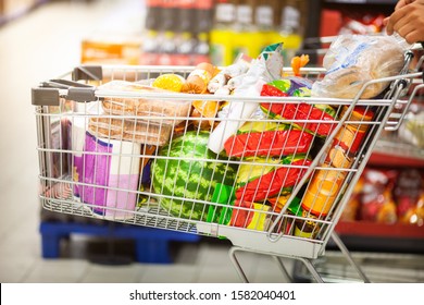 Going Shopping, Full Shopping Cart With Diverse Products In Super Market