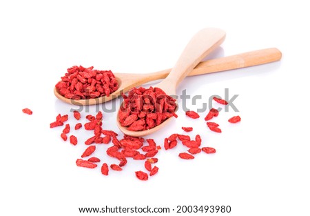 Goji berries,goji berries in woodenspoon isolated on white background