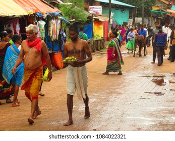 Gokarna Karnataka India December 07, 2017 Unknown people walking in the street of Gokarna town afternoon