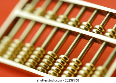 Gold Abacus On Red