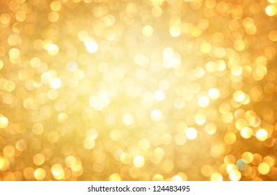 Gold Abstract Background With Bokeh Defocused Lights