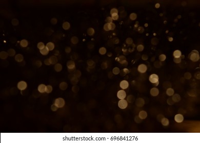 Gold abstract bokeh background, Abstract gold bokeh with black background
