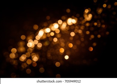 Gold Abstract Bokeh On Black Background