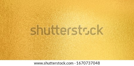 Gold background. Luxury shiny gold texture