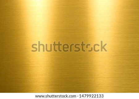 Gold background. Rough golden texture. Luxurious gold paper template for your design.