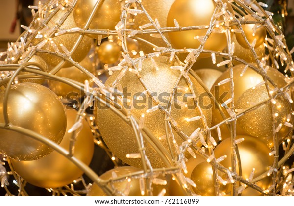 gold\
balls and lights decoration for chrismas festival\
