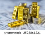 Gold bar lean against the stacking coins on  USD bills . Gold is hard commodity goods, risk asset, tangible value that used to be gold reserve, save assets during war and economic crisis