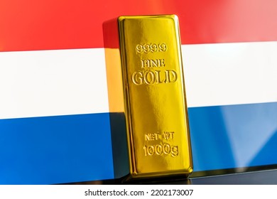 The gold bar is on the national flag of france, french Gold Reserve concept - Shutterstock ID 2202173007