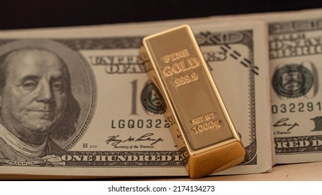 Gold Bar Overlay  Money Dollars, Concept   In A Poor Economy Investors Should Hold Dollar Or Gold.