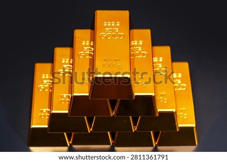 Gold in bars. Gold bar background. Fine gold concept. Gold bar studio background.