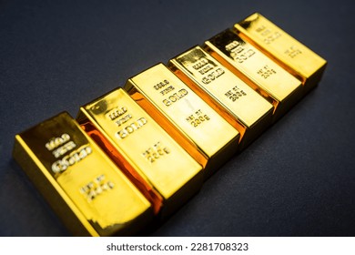 Gold bars isolated on black background. Finance and saving value concept - Shutterstock ID 2281708323