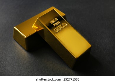 Gold Bars On Black Background