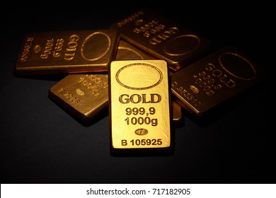 Gold Bars on black background, business concept