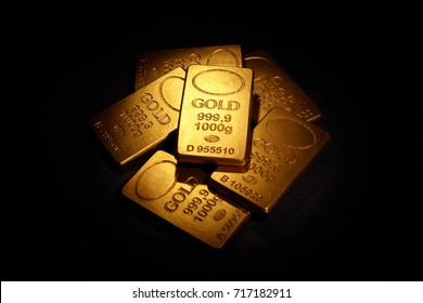 Gold Bars on black background, business concept