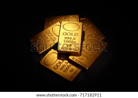 Gold Bars on black background, business concept