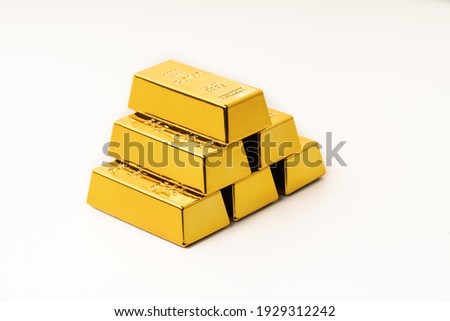 Gold bars on a white background