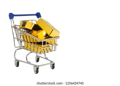 Gold Bars In Shopping Cart On White Background