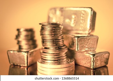 Gold Bars And Stack Of Gold Coins. Background For Finance Banking Concept. Trade In Precious Metals.