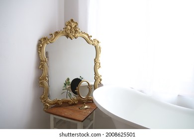 Gold Bathroom Mirror.
Vintage Bathroom Interior 