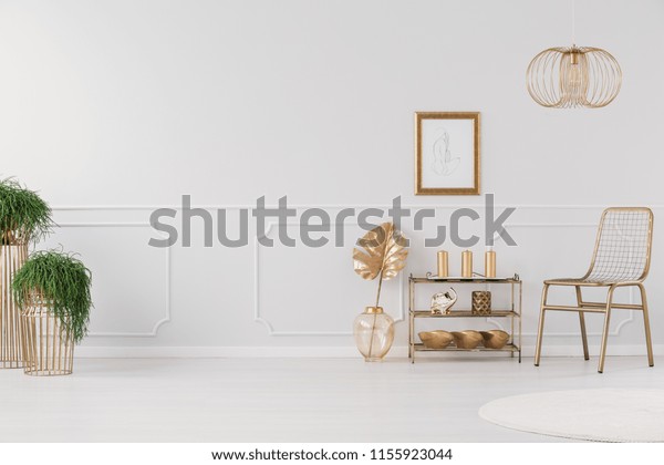 Gold Bedroom On Light Grey Wall Stock Photo Edit Now