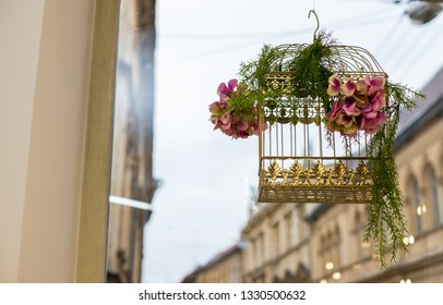 Gold Birdcage Decoration. Flower In Birdcage