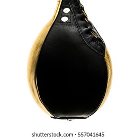 Gold and black leather boxing speed bag isloated on white. Sport equipment for box. Fast speed bag or ball. - Powered by Shutterstock