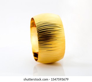 Gold Bracelet On White Background