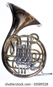 A Gold Brass French Horn Isolated Against A White Background  In The Horizontal Format.