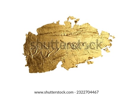 Gold bronze glitter paper piece brushstroke painting blot smear. Abstract glow shine stain on white background.