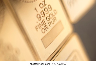 Gold bullion 999.9 purity solid one ounce ingot precious metal bars.