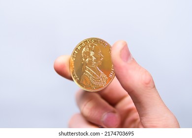 gold bullion coin on a white background. Investing in gold