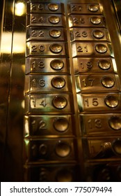 Gold Buttons In The Golden Elevator.