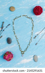 Gold Chain Natural Mixed Pink Rose Quartz Necklace. Flat Lay