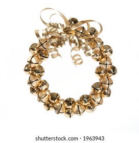 A Gold Christmas Wreath Made Of Bells