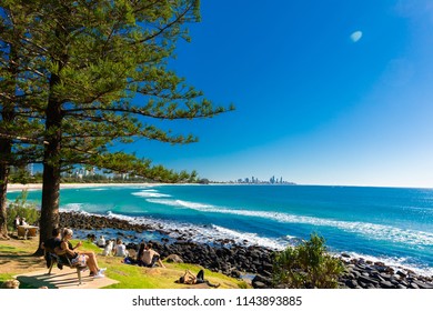 GOLD COAST, AUS - JULY 8 2018: Gold Coast skyline and surfing beach at Burleigh Heads, Queensland, Australia