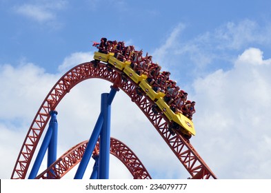 GOLD COAST, AUS -  NOV 20 2014:Visitors Ride On Superman Escape In Movie World Gold Coast Queensland Australia.It's An Accelerator Coaster That Accelerates From 0 To 100 Km Per Hour (62 Mph) In 2 Sec.