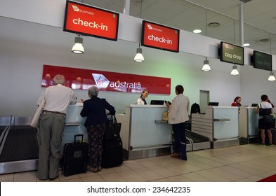 GOLD COAST, AUS - NOV 22 2014:Passengers In Virgin Australia Airlines Check In Desk.It Is Australia's Second-largest Airline As Well As The Largest By Fleet Size To Use The Virgin Brand.