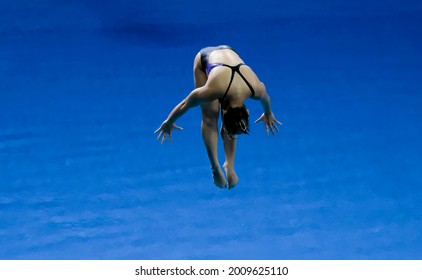 GOLD COAST, AUSTRALIA - APRIL 13, 2018: Athlete competes in the Women's 1m Springboard Diving Final of the Gold Coast 2018 Commonwealth Games.