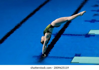 GOLD COAST, AUSTRALIA - APRIL 13, 2018: Athlete competes in the Women's 1m Springboard Diving Final of the Gold Coast 2018 Commonwealth Games.