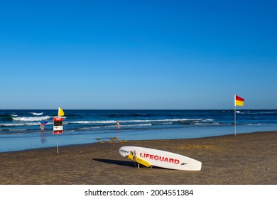 GOLD COAST, AUSTRALIA - APRIL 16, 2018: Lifeguard's surfboard at Main Beach Surfers Paradise. One of the main tourist destinations at Gold Coast.
