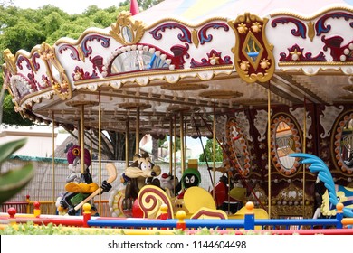 Gold Coast, Australia - April 18, 2018 : A Photo Of Amusement Attraction Merry-go-round In The Movie World With Selective Focus On The Wile E. Coyote, A Character From The Road Runner Cartoon Series.