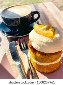 Gold Coast, Australia. September 19, 2019. Orange And Poppyseed Cake And Coffee At Beach Cafe.