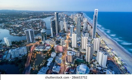 Gold Coast Beautiful Panorama Aerial view of Surfers Paradise City Skyline Cityscape with Light Trails from Q1 Building at dusk in summer Sunset, Australia