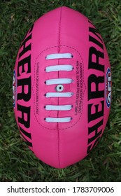 Gold Coast, Queensland/Australia - 07 26 2020: Pink Australian Rules Football With Sherrin And AFL Logo